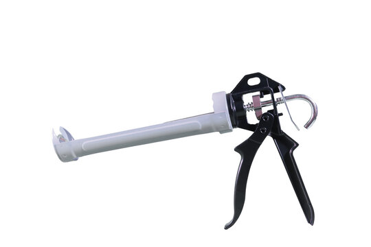 Silicone glue gun. Caulk gun isolated on white. For working with adhesive, silicone and other construction fillers.