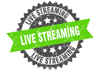 live streaming stamp. grunge round sign with ribbon