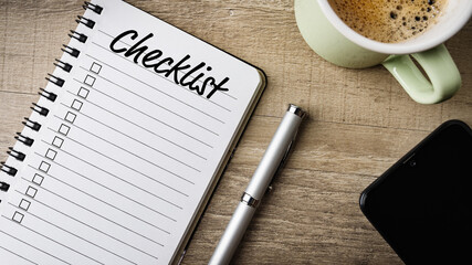 Notepad with text on it: checklist