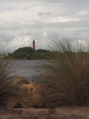 Jupiter Lighthouse on Stormy Day - View from Coastal Shore © BVNickel