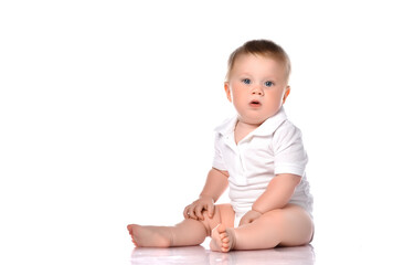 One baby boy with funny cute expression isolated on white.