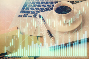 Double exposure of forex chart drawing and desktop with coffee and items on table background. Concept of financial market trading