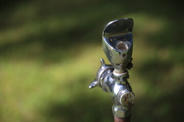 Close up of a drinking fountain in the park.