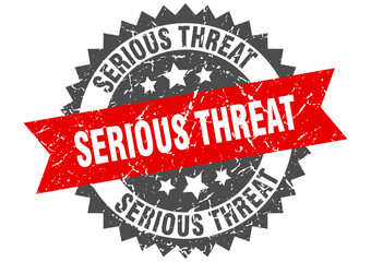 Obraz premium serious threat stamp. grunge round sign with ribbon