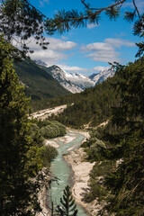 View of the Isar River close to Scharnitz village, austrian Alps, during the summer