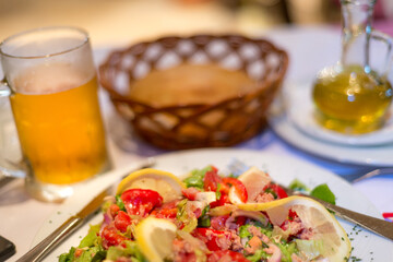Montenegrin mixed tomato salad with lemon and herbs,Podgorica,Montenegro.
