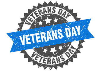 veterans day stamp. grunge round sign with ribbon