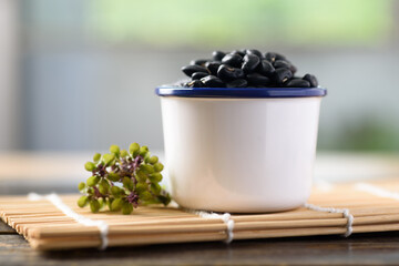 Fototapeta na wymiar Close up of organic black beans in healthy food concept