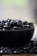 Close up of organic black beans in healthy food concept