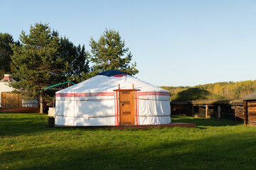 Fototapeta na wymiar Buryat yurts on the background of a natural landscape.
