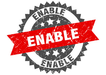 enable stamp. grunge round sign with ribbon