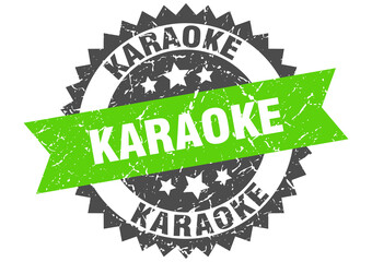 Obraz premium karaoke stamp. grunge round sign with ribbon