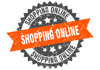 shopping online stamp. grunge round sign with ribbon