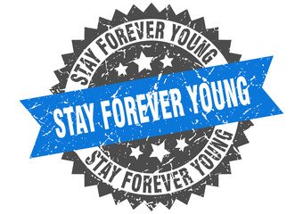 stay forever young stamp. grunge round sign with ribbon