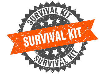 survival kit stamp. grunge round sign with ribbon