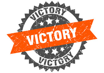 victory stamp. grunge round sign with ribbon