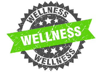 wellness stamp. grunge round sign with ribbon