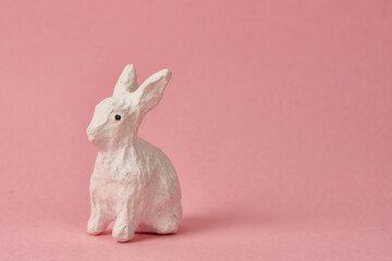 Easter bunny on a pink background toy animal holidays