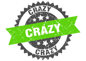 crazy stamp. grunge round sign with ribbon