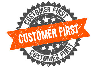 customer first stamp. grunge round sign with ribbon