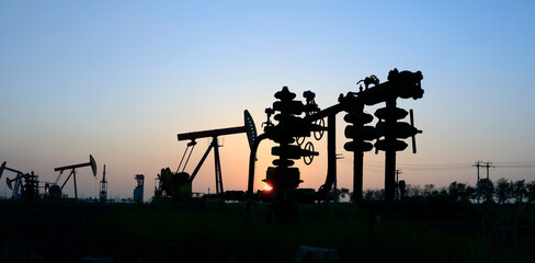 In the field, the oil pipeline in the evening