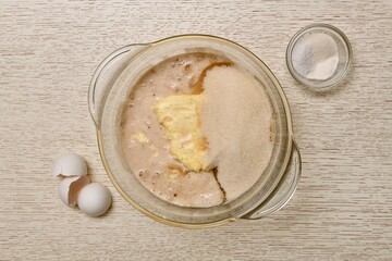  The step of adding salt, baking powder and vanilla to a mixture. Dough preparation process.