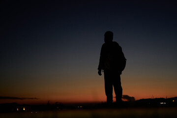 Fototapeta na wymiar silhouette of a person on a sunset