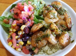 Tex-Mex shrimp salad with guacamole, salsa and tortilla strips