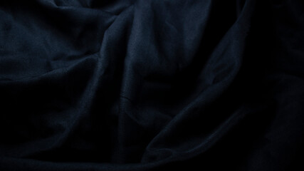 The surface of the black cloth with wavy marks