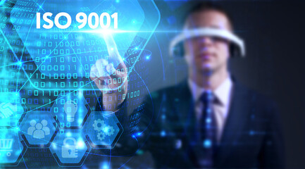 Business, technology, internet and network concept. Young businessman thinks over the steps for...