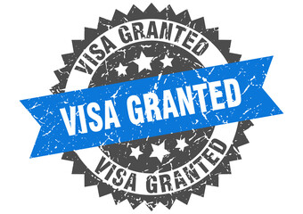 Obraz premium visa granted stamp. grunge round sign with ribbon