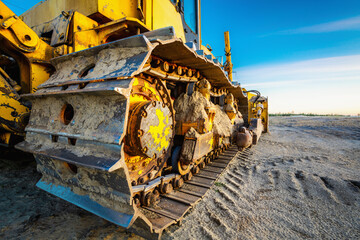 Fototapeta premium Iron track of large tractor for driving on sand and mud.