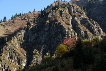 Almaty / Kazakhstan - 09.25.2020 : View of the Medeo tract and mountains with different vegetation from the height of the cable car.