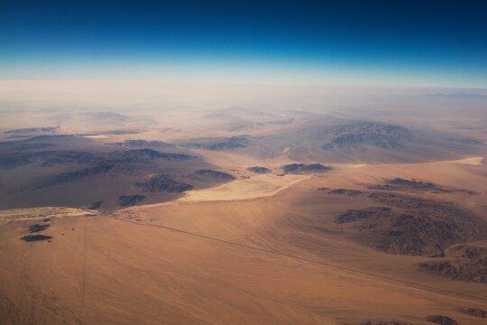 This aerial image shows a breathtaking view of vast desert landscape.