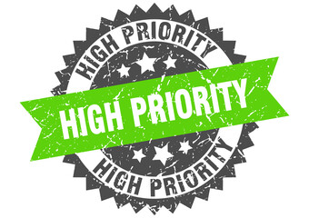 high priority stamp. grunge round sign with ribbon
