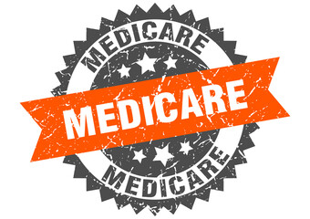 medicare stamp. grunge round sign with ribbon