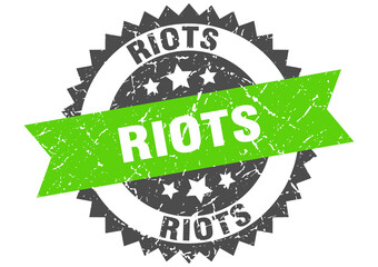 riots stamp. grunge round sign with ribbon