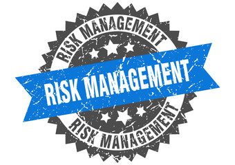Obraz premium risk management stamp. grunge round sign with ribbon