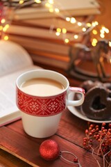 Winter tea.Winter break and holidays time. Cozy winter reading. Books for Christmas and New Year.Winter mood.Christmas and New Year festive background.