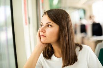 Young female passenger in public land transport © JackF