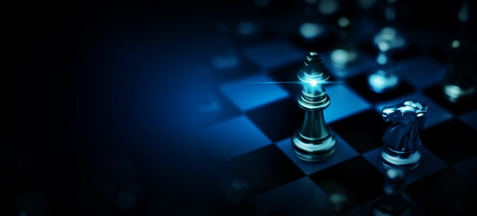 Chess board game to represent the business strategy with competition and challenging concept - obrazy, fototapety, plakaty