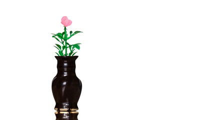 Small flower vase with an artificial plant in it