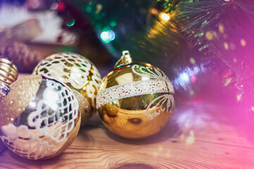 Obraz premium Christmas background. Close-up view of festive Christmas decorations and gift boxes. Celebrating Christmas