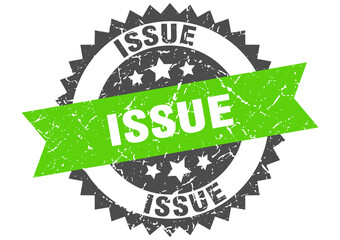 issue stamp. grunge round sign with ribbon