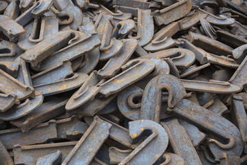 many metal pieces heap detached rusty iron parts