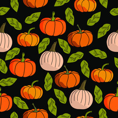 Seamless pattern with pumpkins of orange shades of different shapes and green leaves on a black background, vector illustration for design and creativity