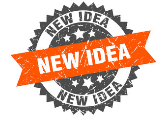 new idea stamp. grunge round sign with ribbon