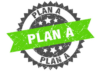 plan a stamp. grunge round sign with ribbon