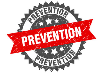 prevention stamp. grunge round sign with ribbon