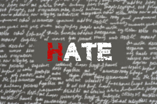 A blackboard with the word hate